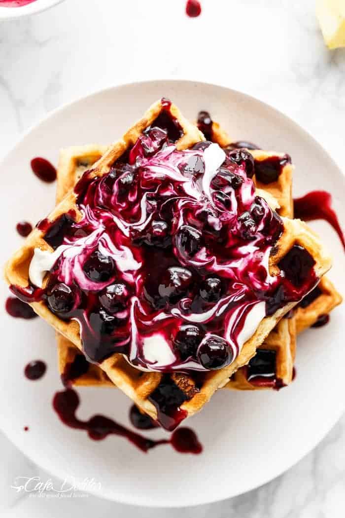 Blueberry Lemon Cheesecake Waffles: Bursting Blueberries & Creamy Topping